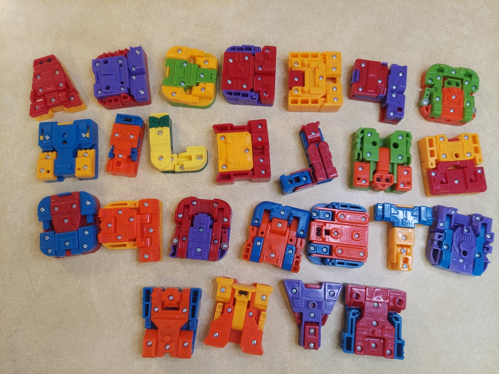 Alpha Bots Transforming Robot Transformers 25 Letter Set MISSING V