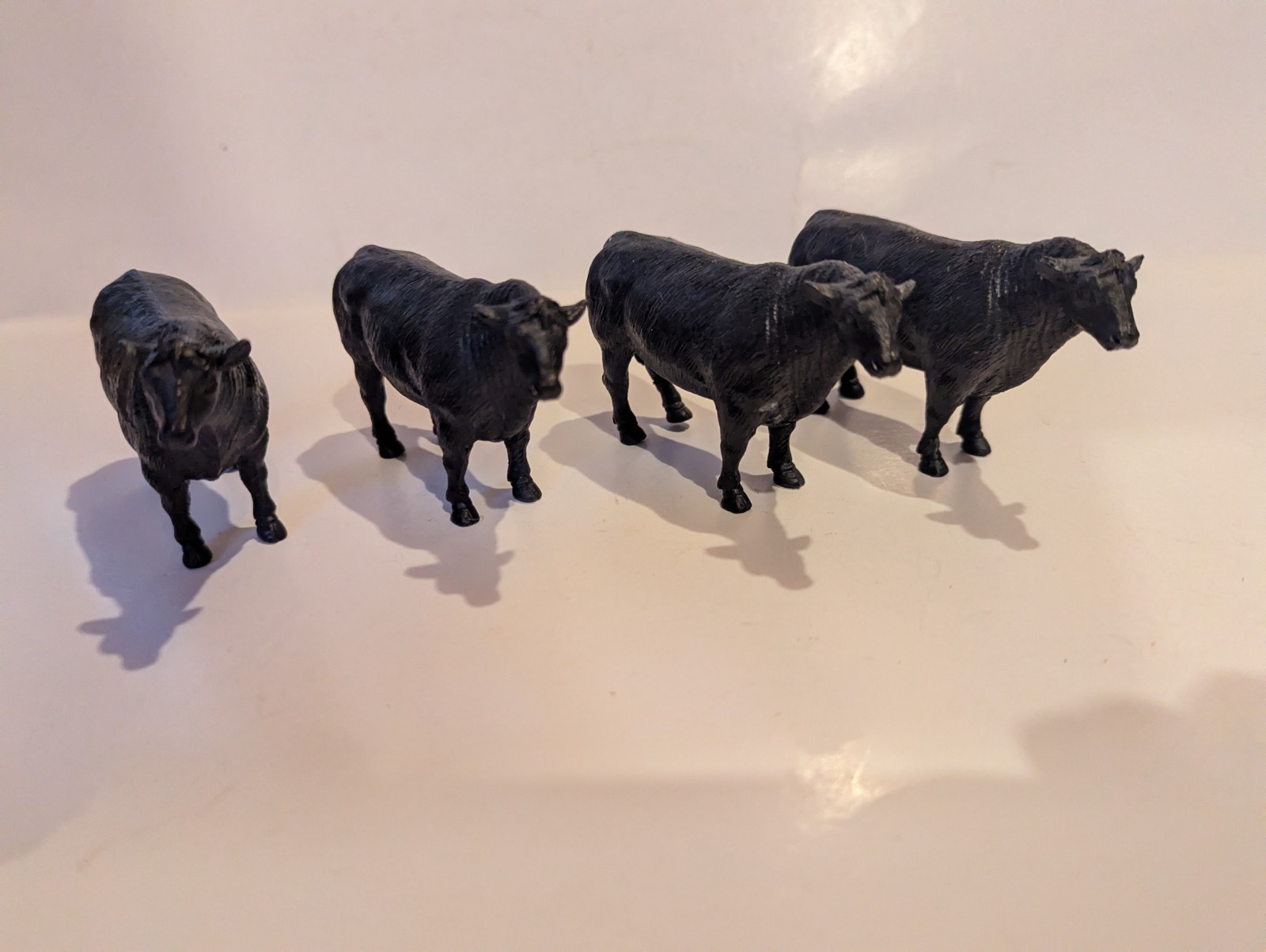 Lot of 4 New Ray Black Angus Cows (3 5/8″)