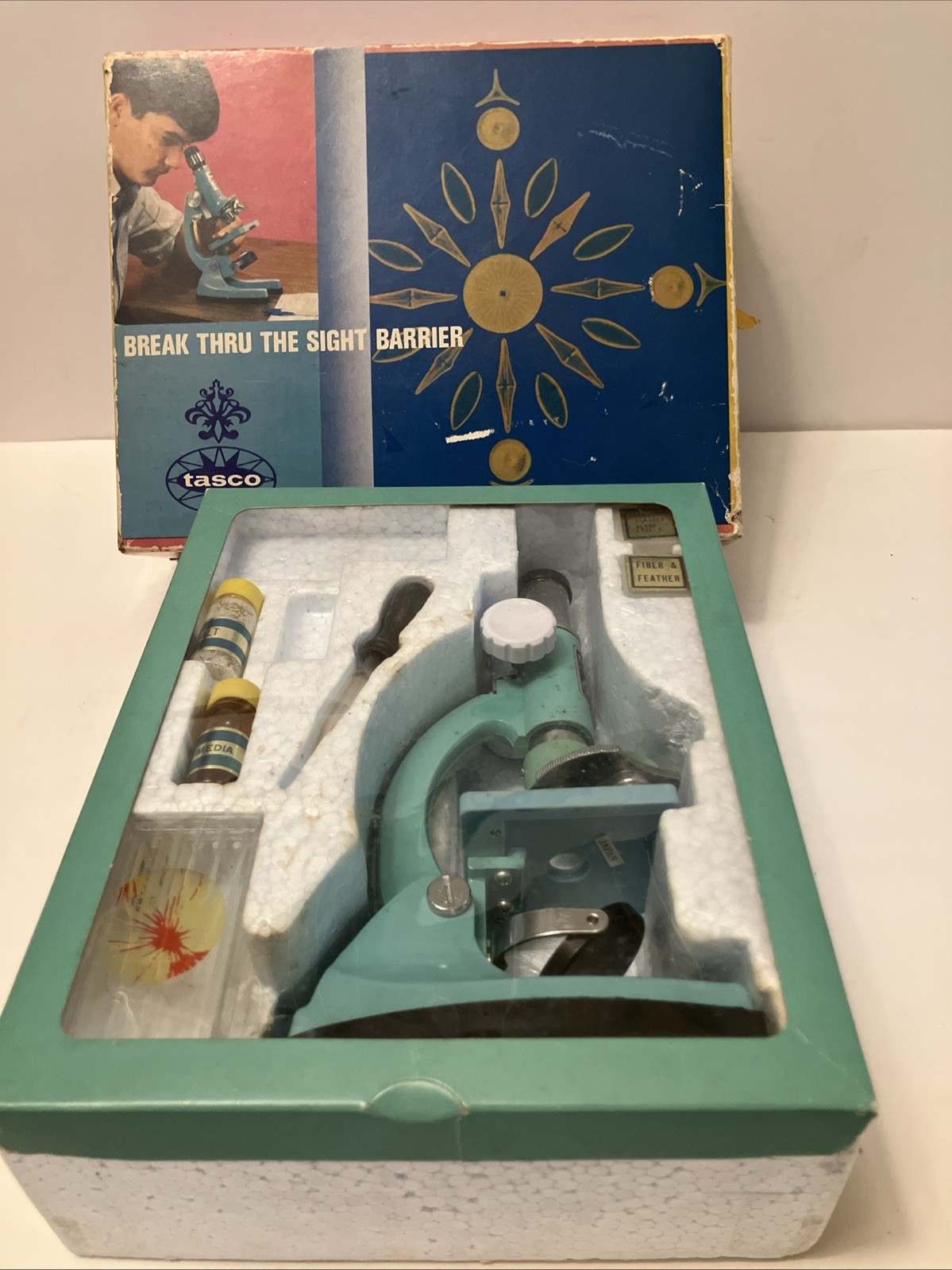 1960’s-70’s ear TASCO #991 Junior 50x, 100x, 300x turquoise microscope in box
