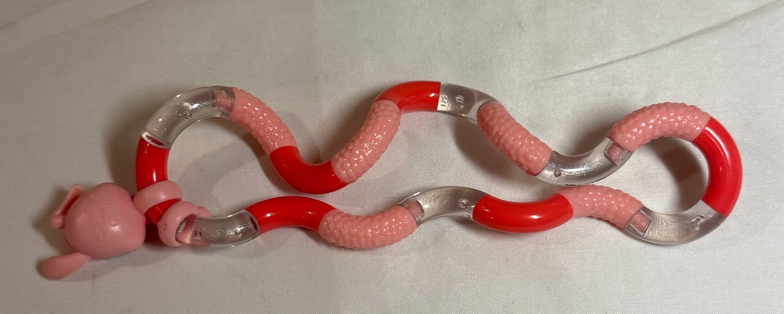 Tangled Jr Pets – Bendy the Bunny Fidget Toy – Red, Pink, Clear