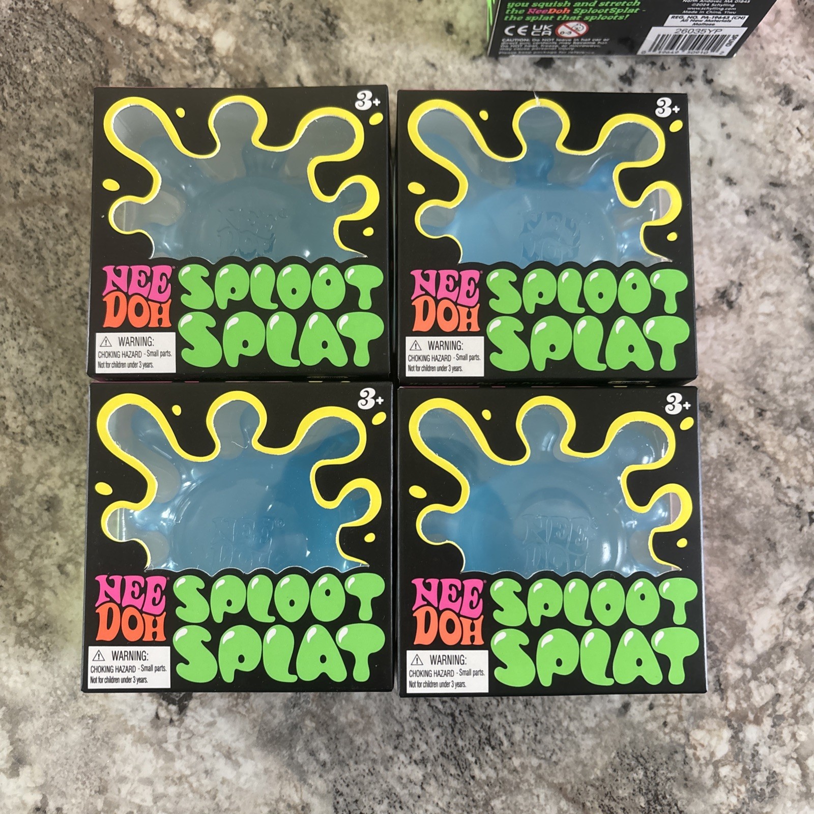 Needoh Lot Of 12 Sploot Splat Squish, Stretch, Splat Schylling Pink/Green/Blue