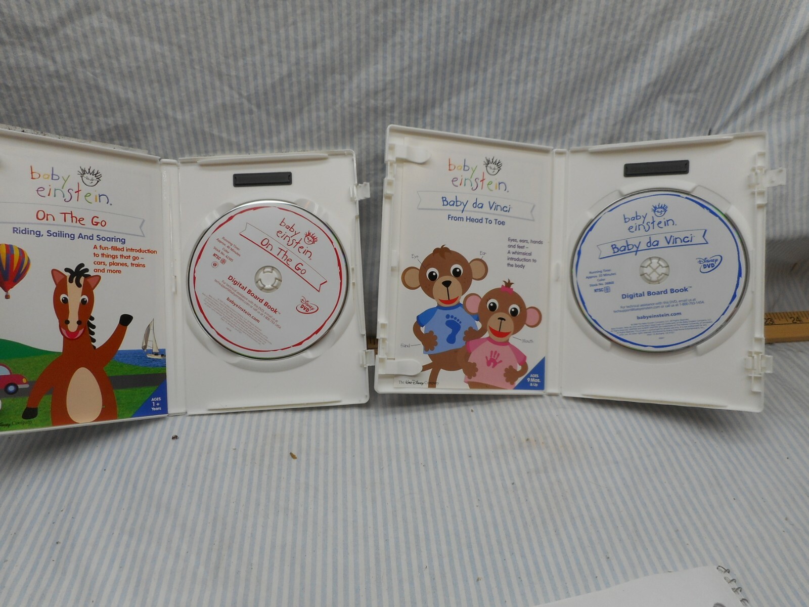 2 Baby Einstein DVD, On teh Go & Baby Da Vinci