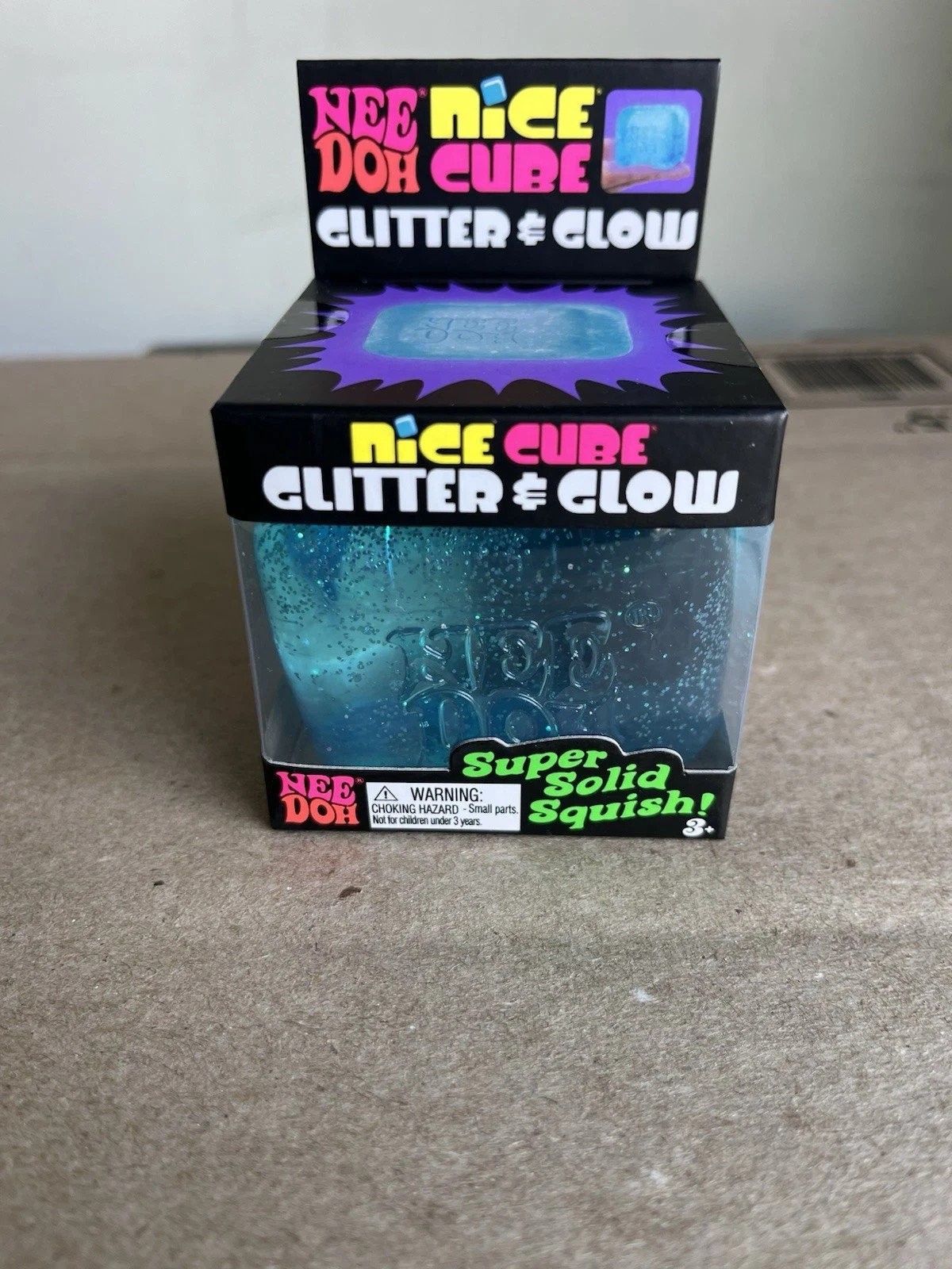 NeeDoh Nice Cube Glitter and Glow Nee Doh Squishy Glowing Ice Schilling Toy BLUE