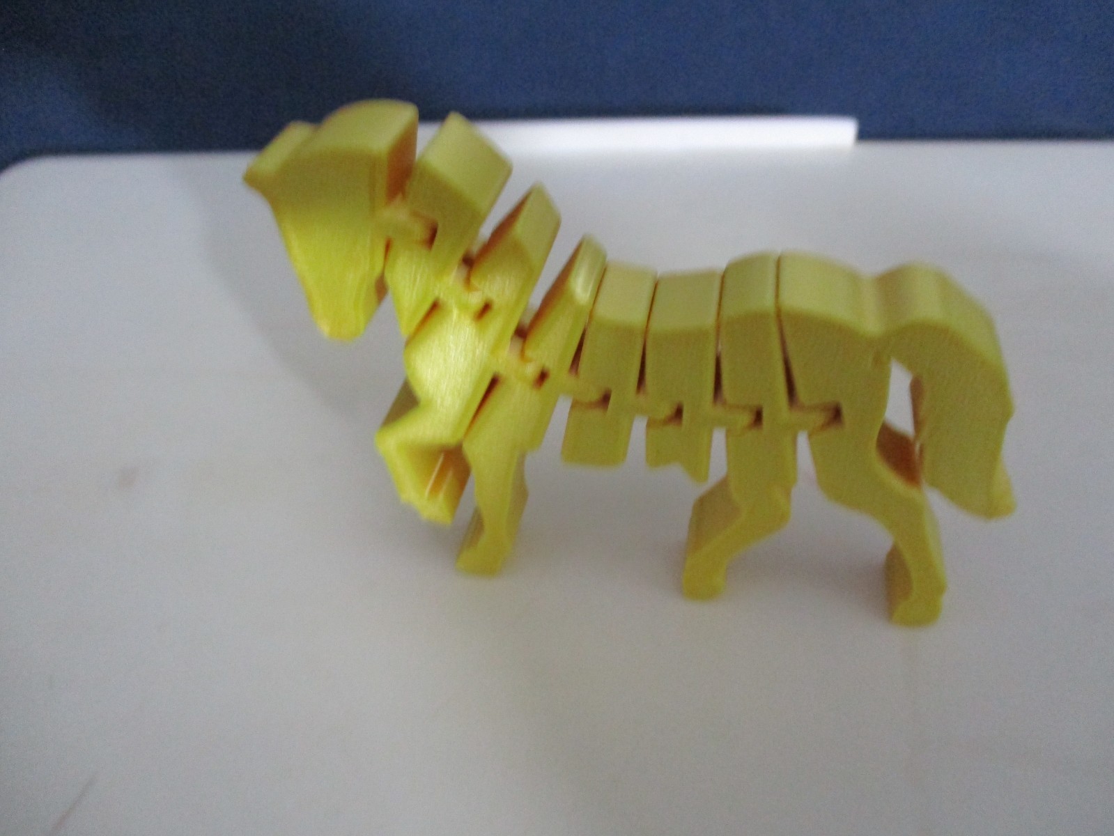 2 FLEXI SENSORY TOY HORSE 4 INCHES LONG YELLOW AND BLUE