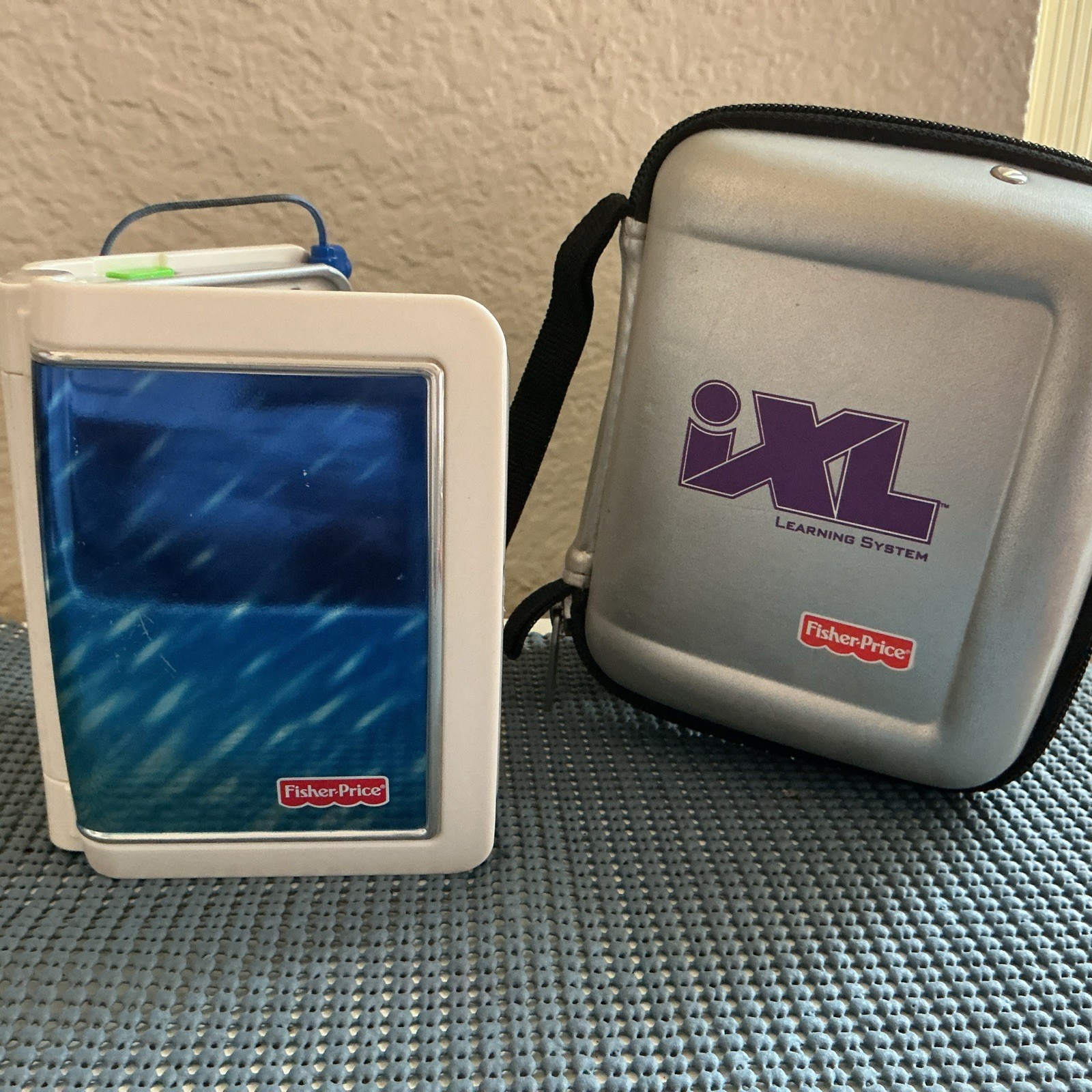 Fisher Price IXL Learning System Foldable Handheld Book-Blue With Case 2010
