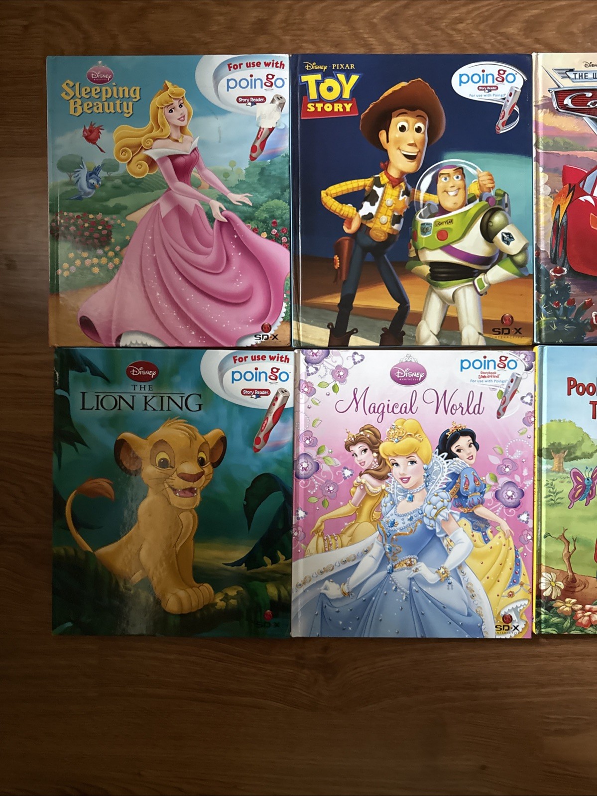 Poingo Books Lot of 8 – Cars, Toy Story, Finding Nemo, Lion King & more