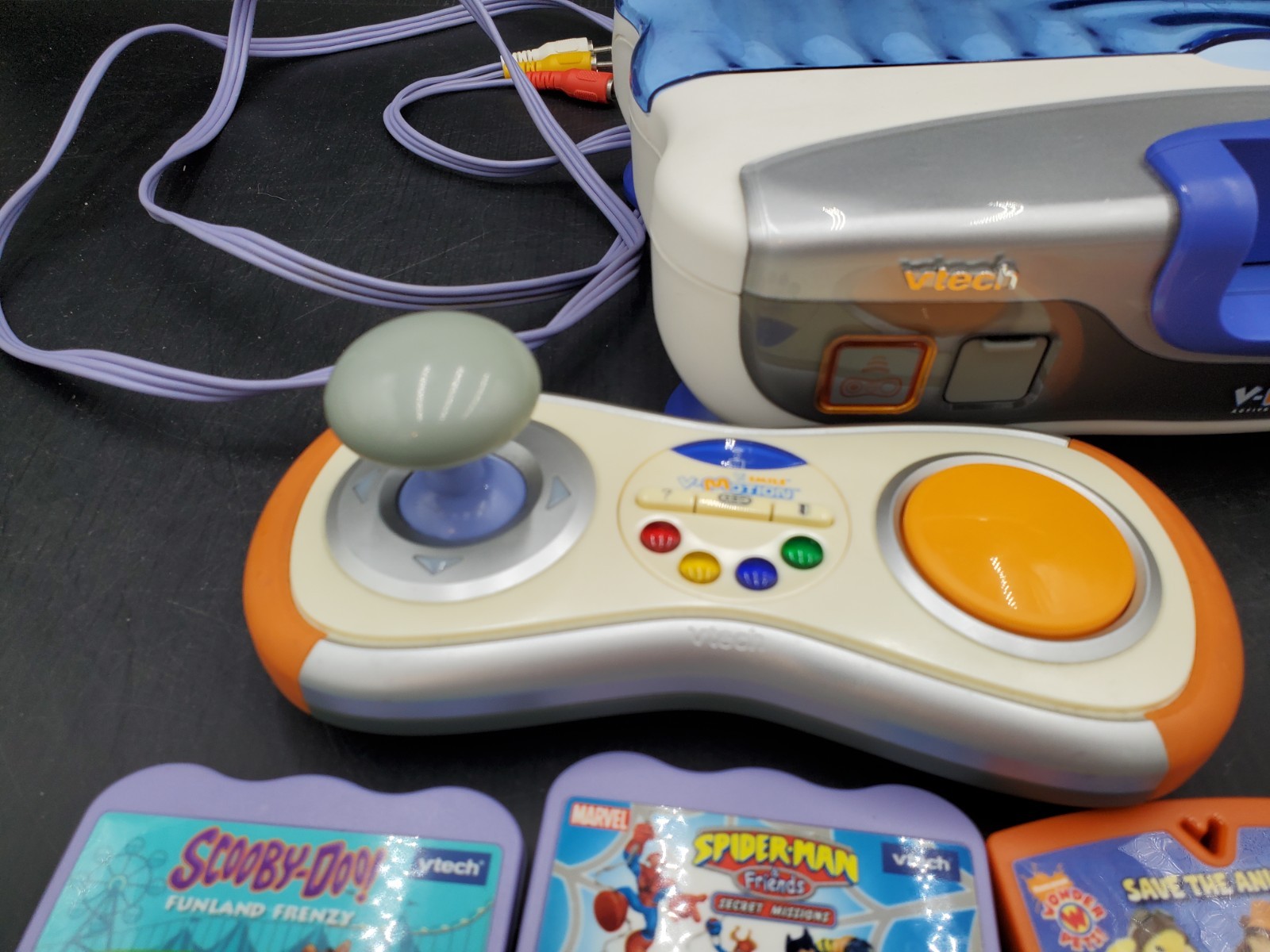 Vtech V.Smile V-Motion Active Learning Gray Console w/5 Cartridge game powers up