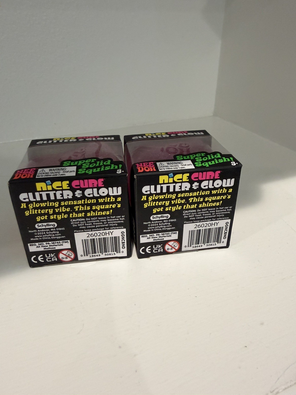 Lot of 2 NeeDoh Nice Cube Glitter and Glow Nee Doh Ice Cube Pink New
