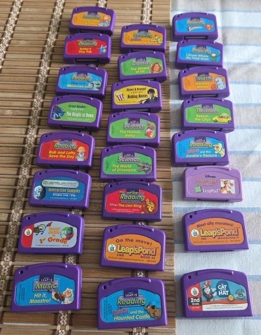 LeapFrog LeapPad Game Cartridges Lot of 24-Lion King, Monsters Inc, Scooby Doo