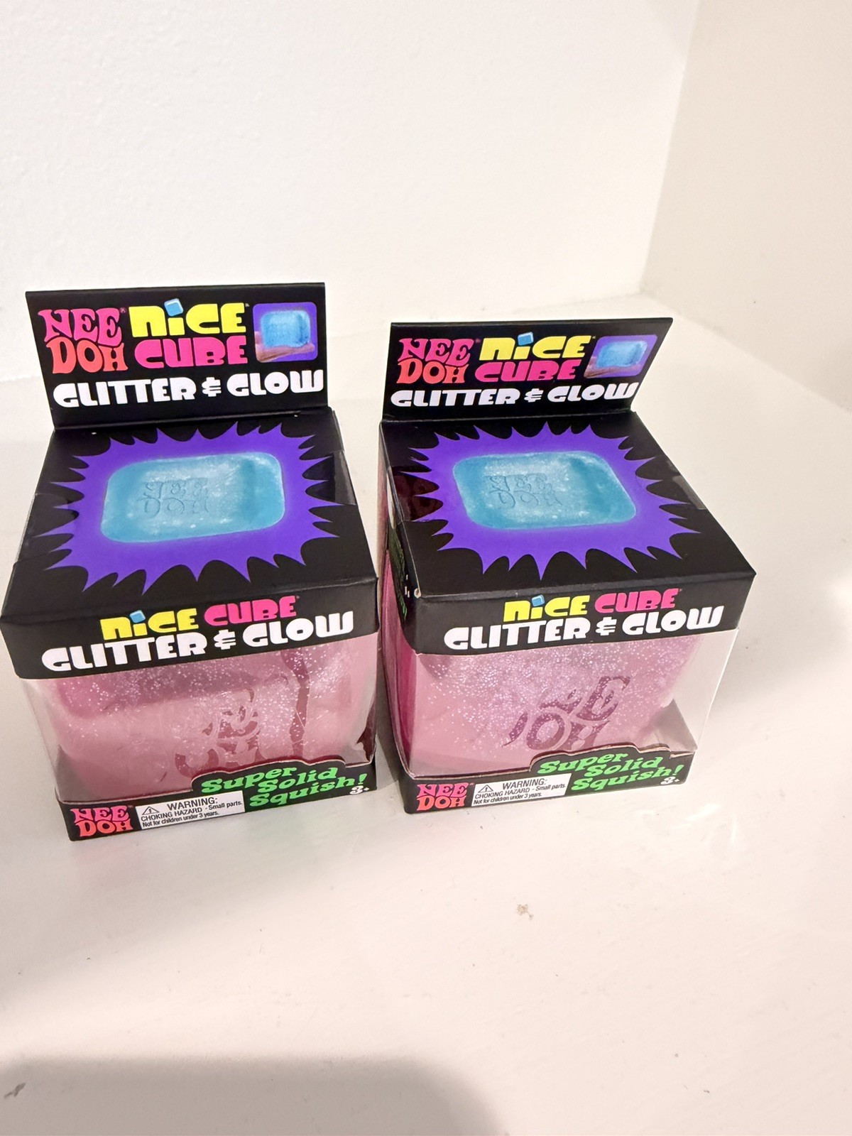 Lot of 2 NeeDoh Nice Cube Glitter and Glow Nee Doh Ice Cube Pink New