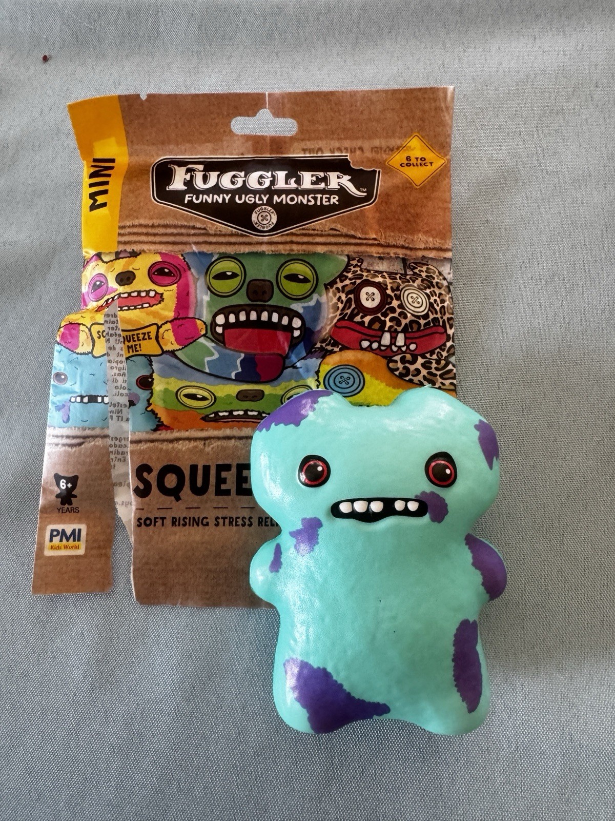 New Fuggler Squeezables 4″ Soft Rising Stress Relief Foam Gaptooth McGoo Teal
