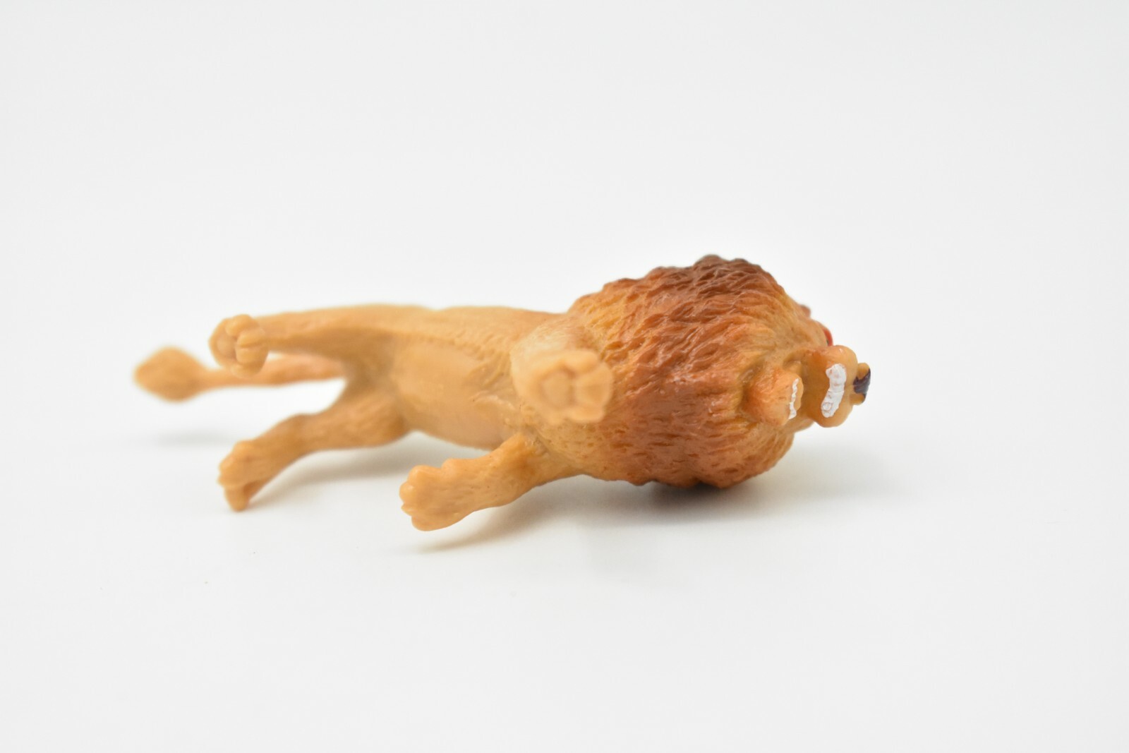 Lion, Small Plastic Animal 2 7/8 inches 1 1/2 inches tall – F3550 B17