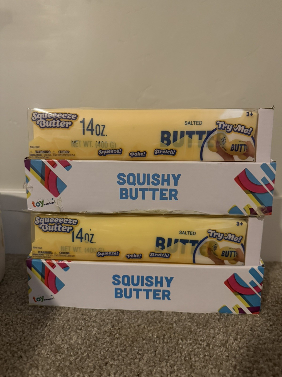 Case of 6 toymendous jumbo squishy butter in display case.