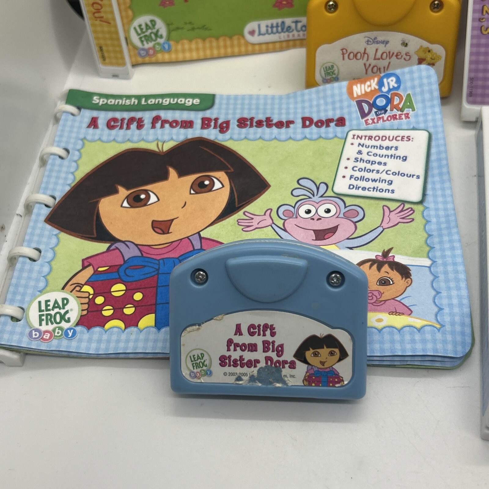 Leap Frog Baby 4 Pack Dora, Rainbow Fish, Disney Pooh, & If I Were Books & Cartr