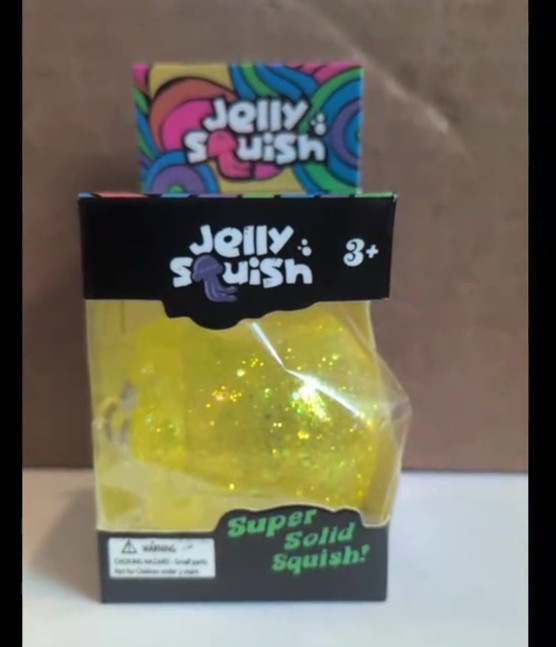 JELLY SQUISH Yellow squeezy stretchy Jellyfish with wiggly tenacles