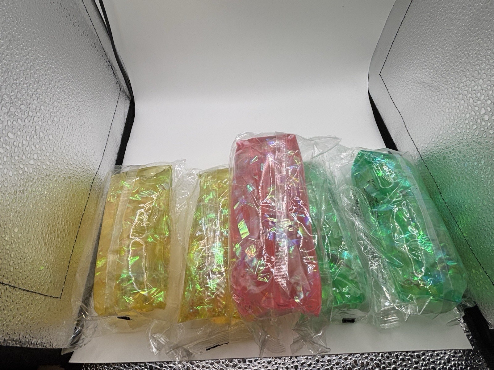 Water Wiggler Fidget Toy Stress Relief 5 Pack. 2 Green 2 Yellow 1 Pink