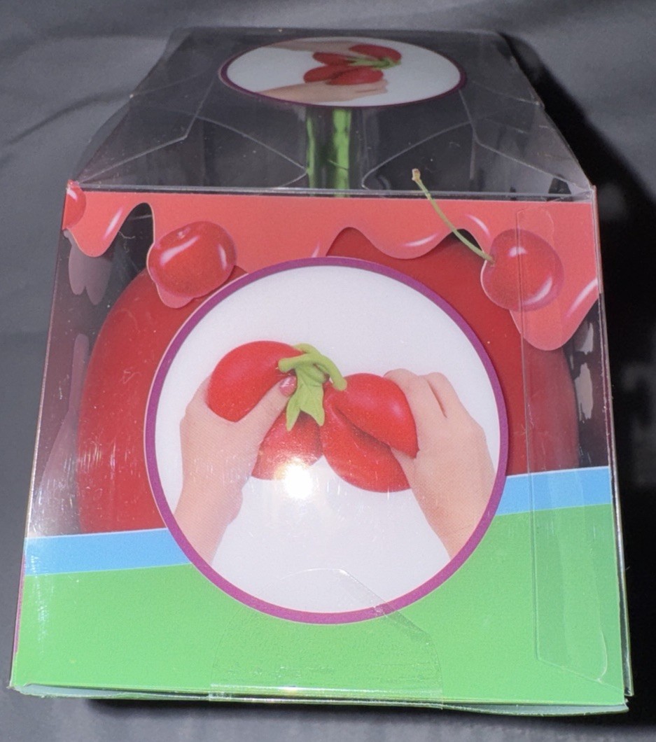 Sunny Days Squeezy Cherry Tactile Squeeze Toy Red Green 3+ 571075