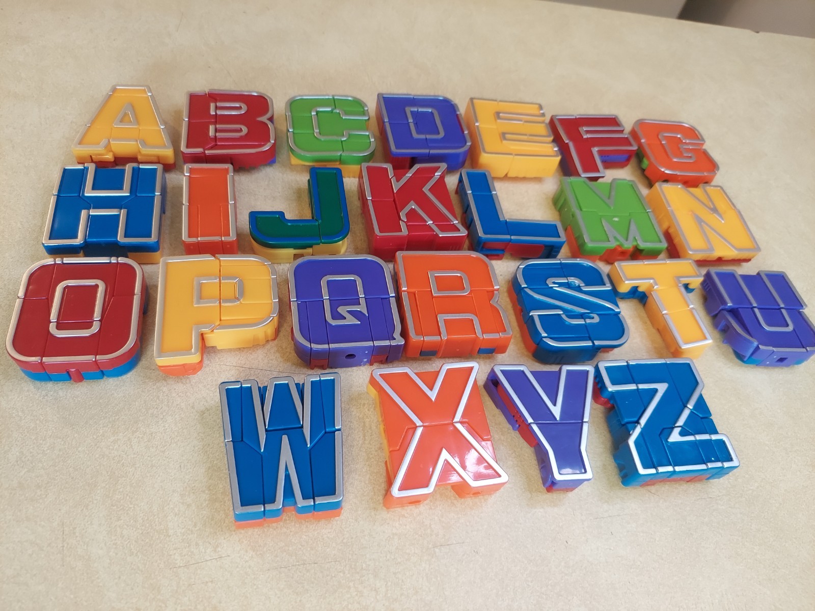 Alpha Bots Transforming Robot Transformers 25 Letter Set MISSING V