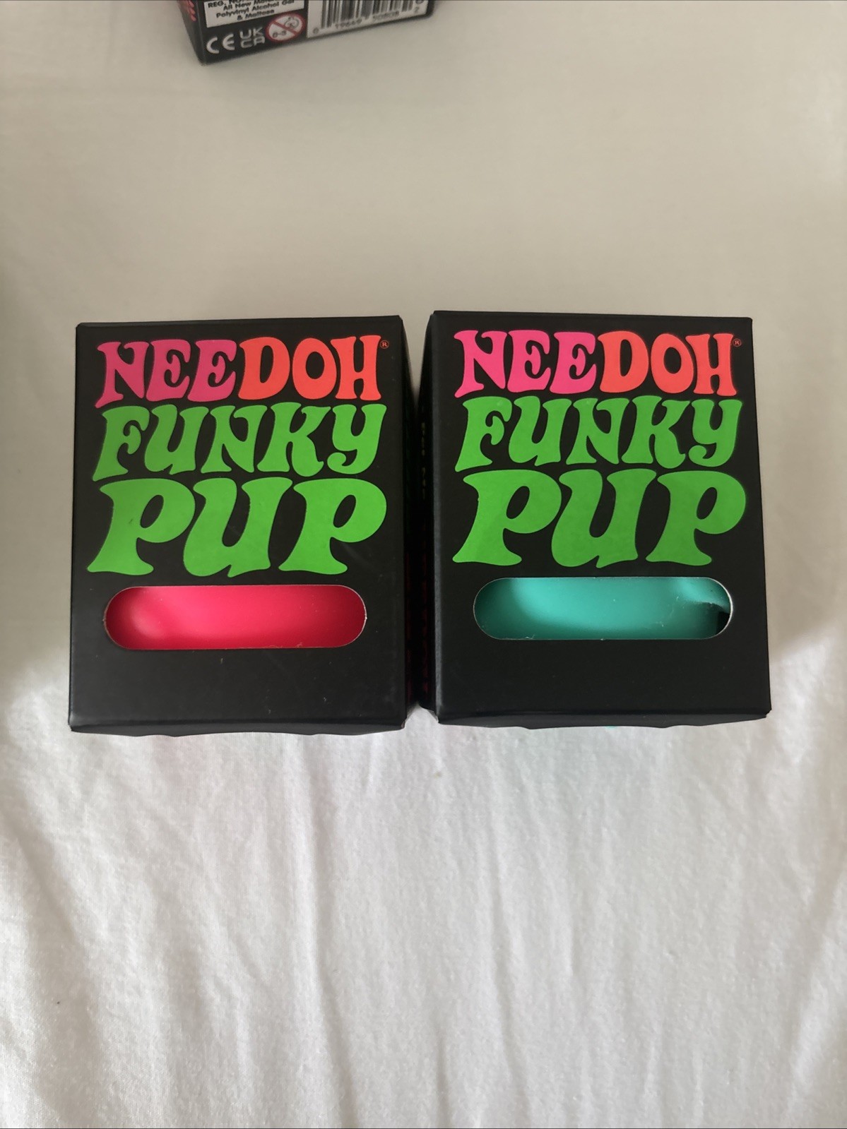 Lot of 2 NEEDOH Funky Pup Squishes Pink and Turquoise Factory sealed