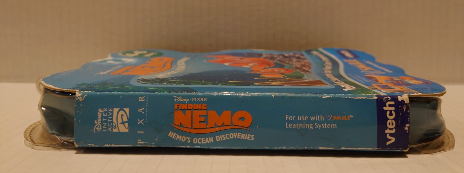 Vtech vsmile game Finding Nemo New in box but box is damaged and has wear on it