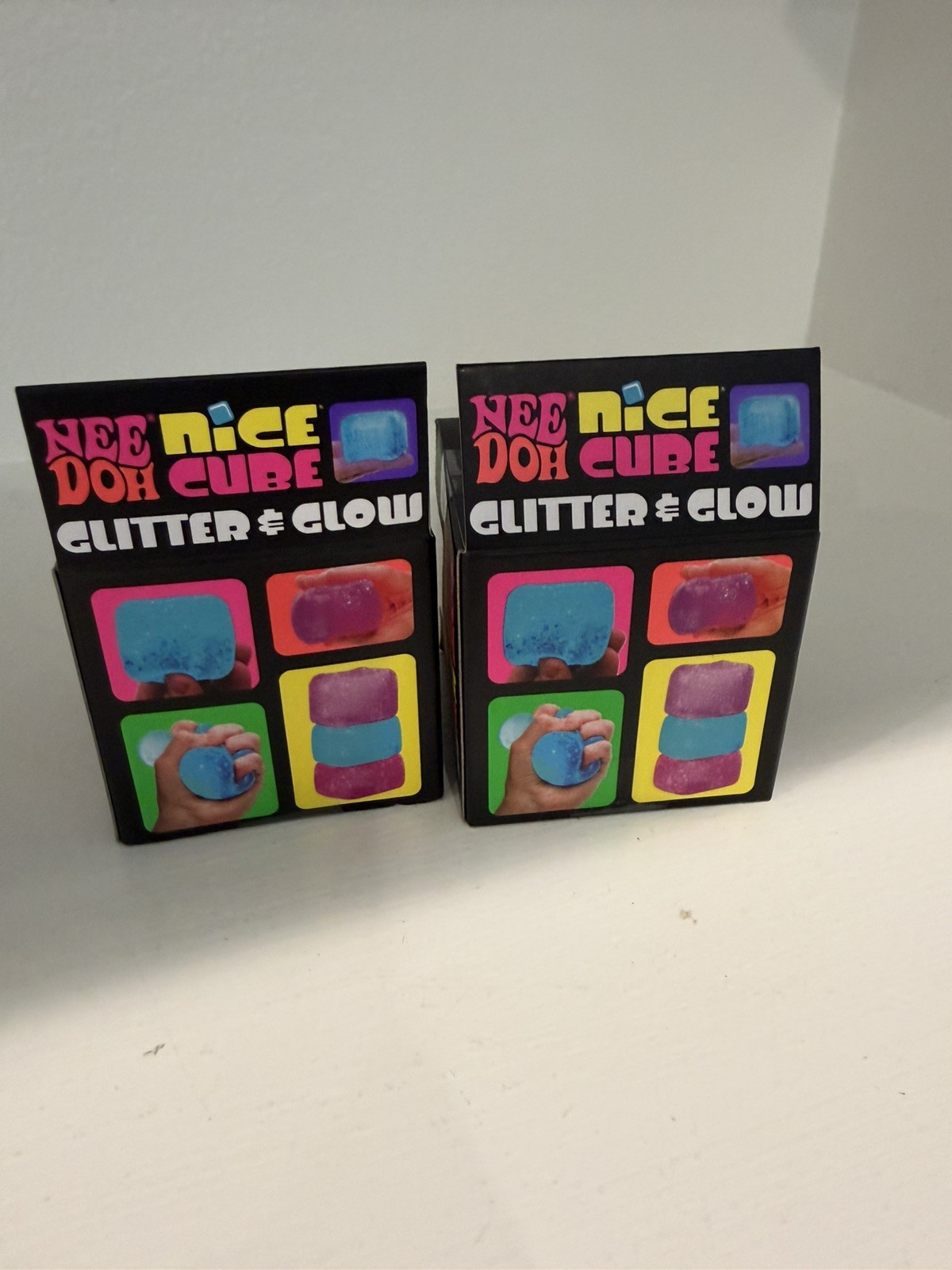 Lot of 2 NeeDoh Nice Cube Glitter and Glow Nee Doh Ice Cube Pink New