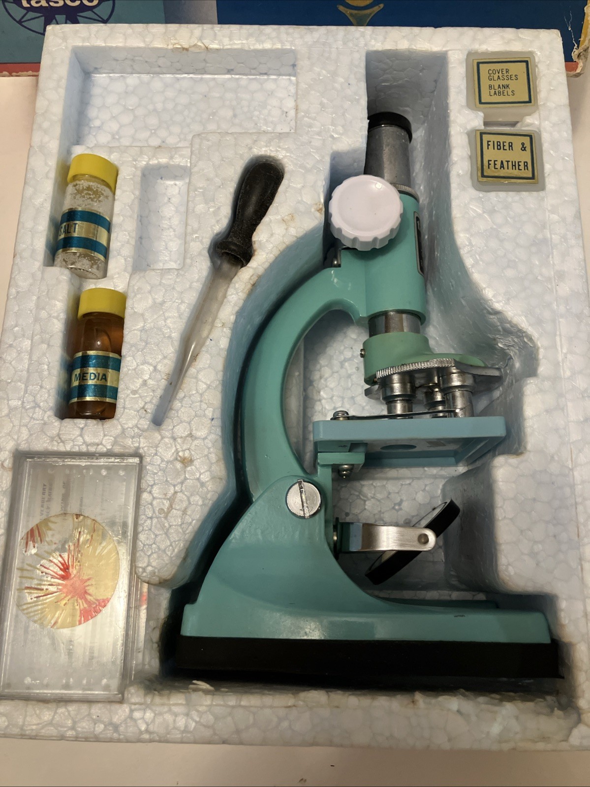 1960’s-70’s ear TASCO #991 Junior 50x, 100x, 300x turquoise microscope in box