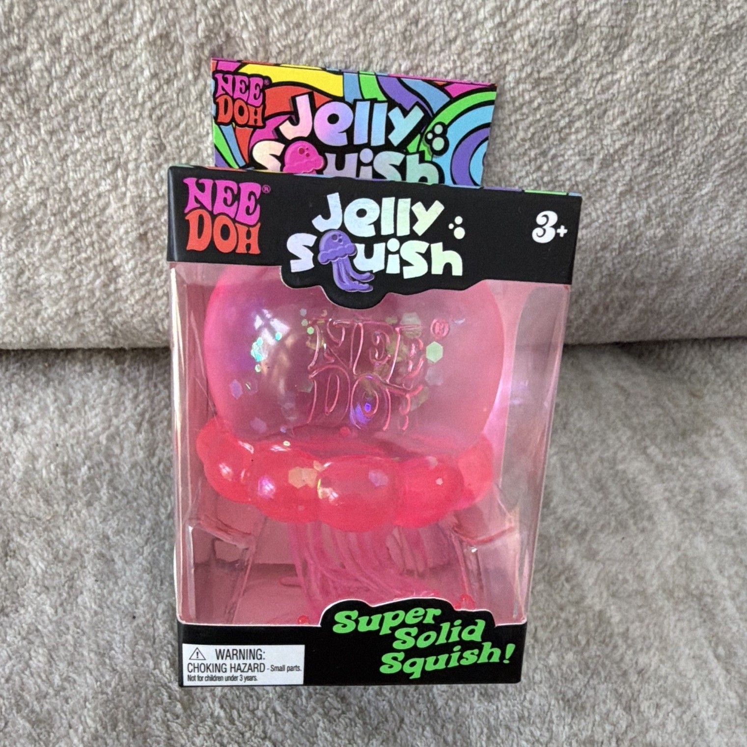 NeeDoh Jelly Squish Super Solid Squish Squeeze Toy Pink Purple 2025 25330NAB