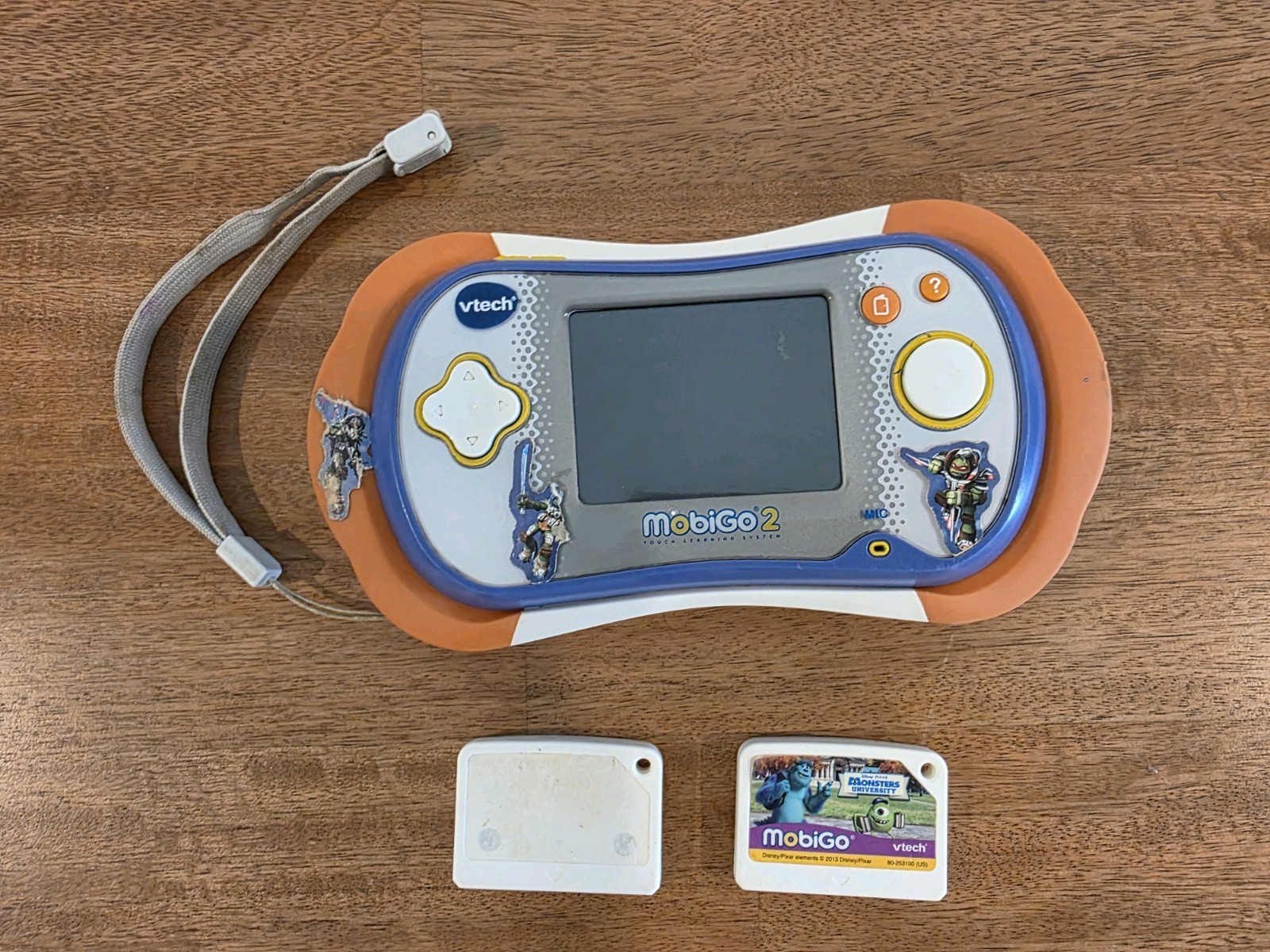 Vtech MobiGo 2 Touch Learning System + 2 Video Game WORKS Monster Inc & unknown