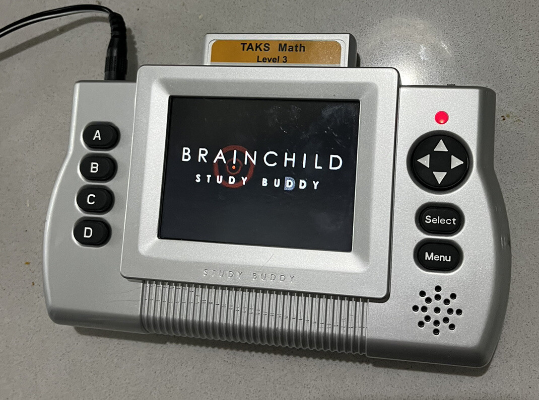 BRAIN CHILD STUDY BUDDY CONSOLES W/TAKS MATH AND CHARGER & BAG