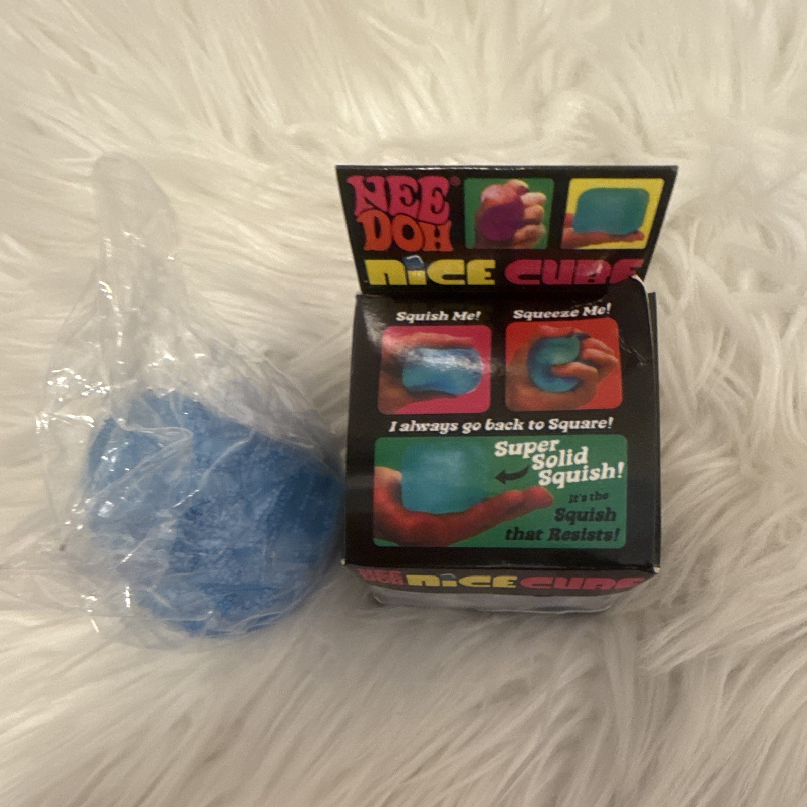 Schylling Nee Doh Nice Cube Squish toy. *Comes with another squishy. ￼