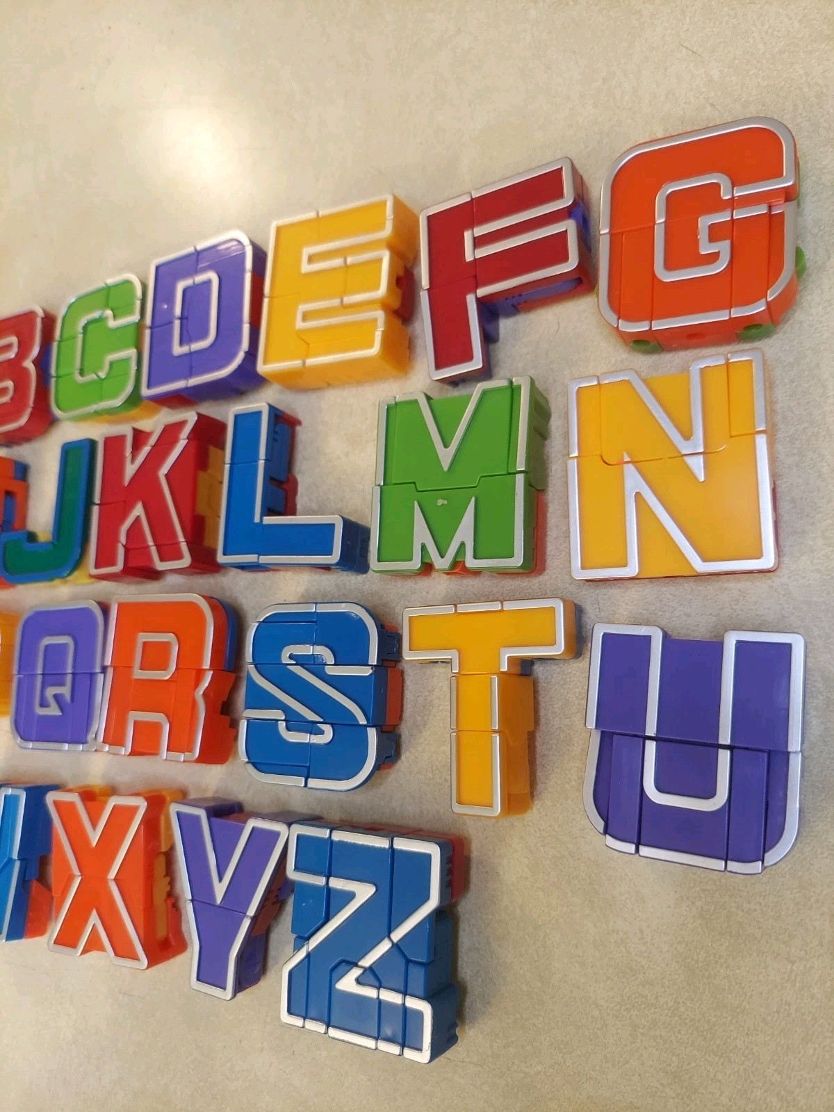 Alpha Bots Transforming Robot Transformers 25 Letter Set MISSING V
