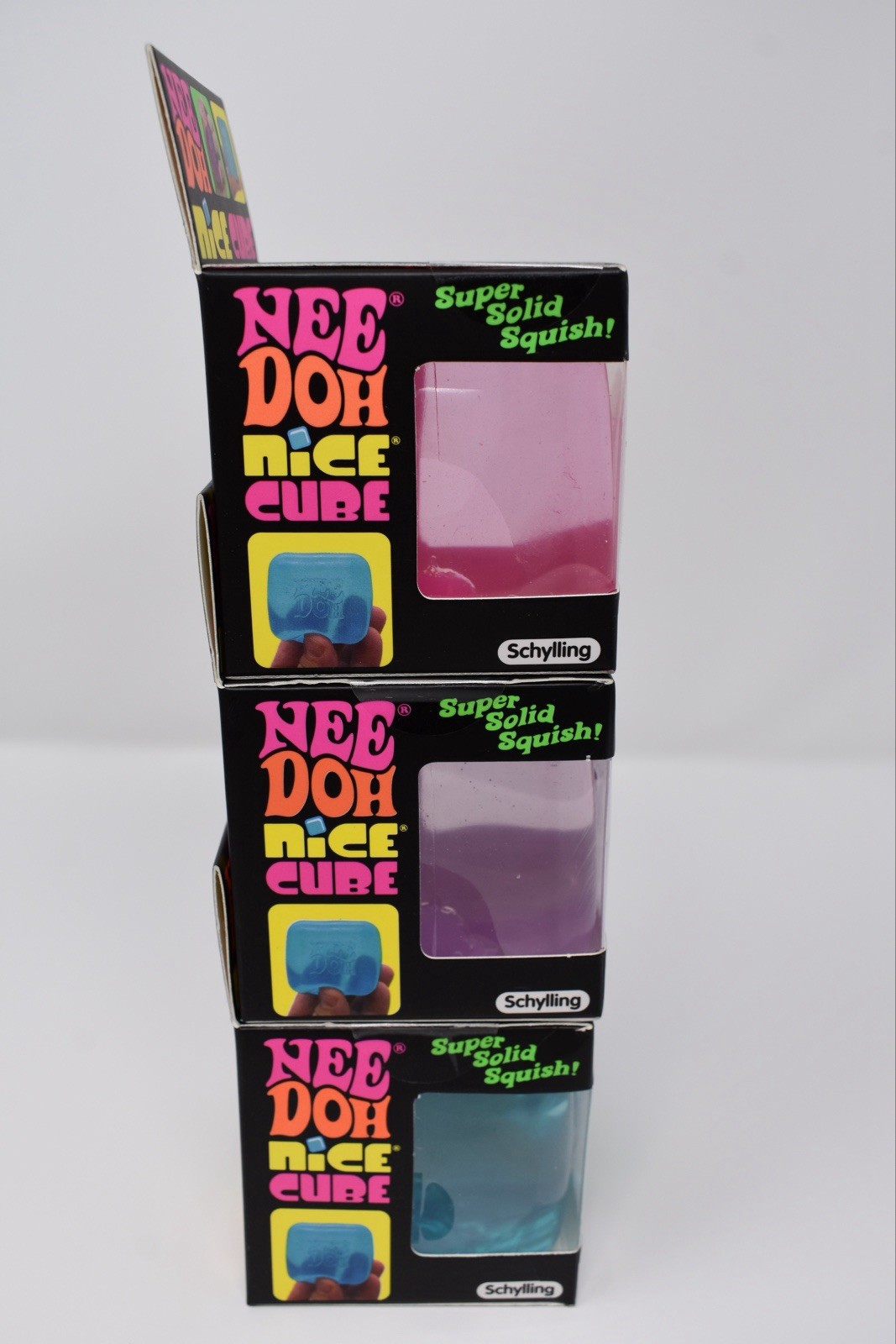 NeeDoh Nice Cube Super Solid Squish! – Lot Of 3 Blue, Purple, Pink