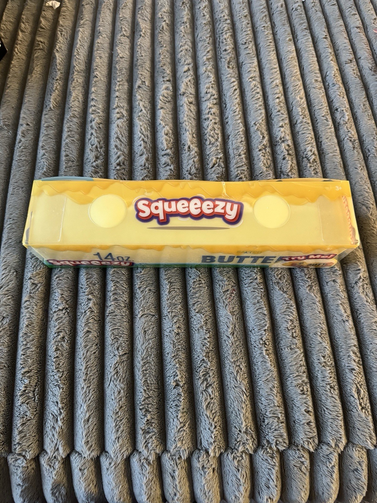 Sunny Days Squeezy Butter Tactile Squeeze Toy 14 oz Yellow Green Blue 571064