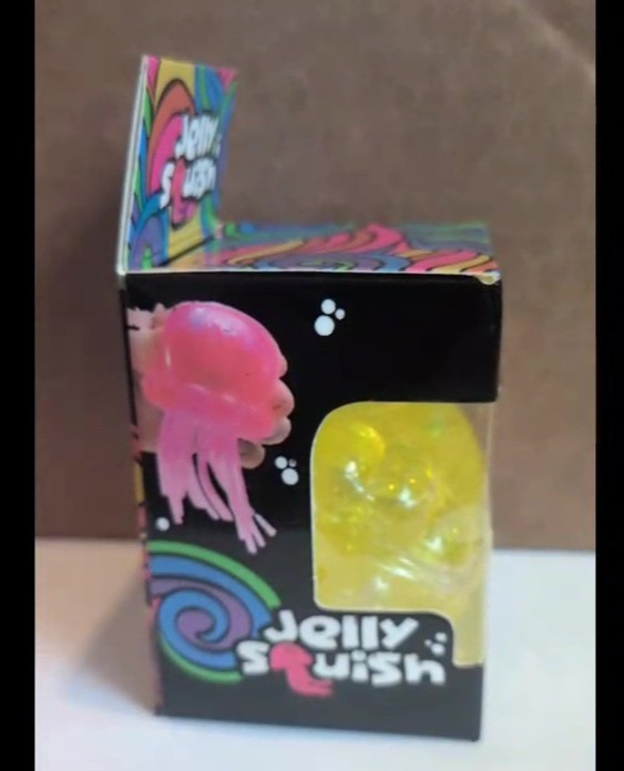 JELLY SQUISH Yellow squeezy stretchy Jellyfish with wiggly tenacles