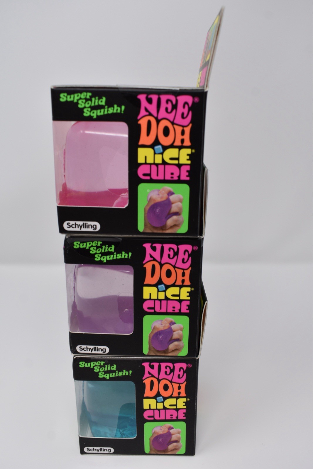 NeeDoh Nice Cube Super Solid Squish! – Lot Of 3 Blue, Purple, Pink