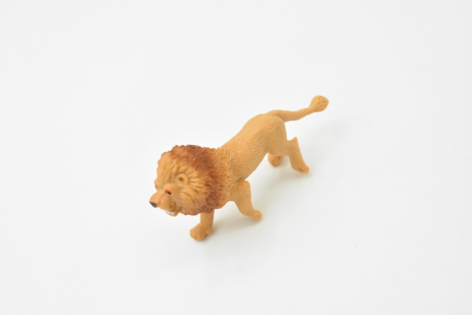 Lion, Small Plastic Animal 2 7/8 inches 1 1/2 inches tall – F3550 B17