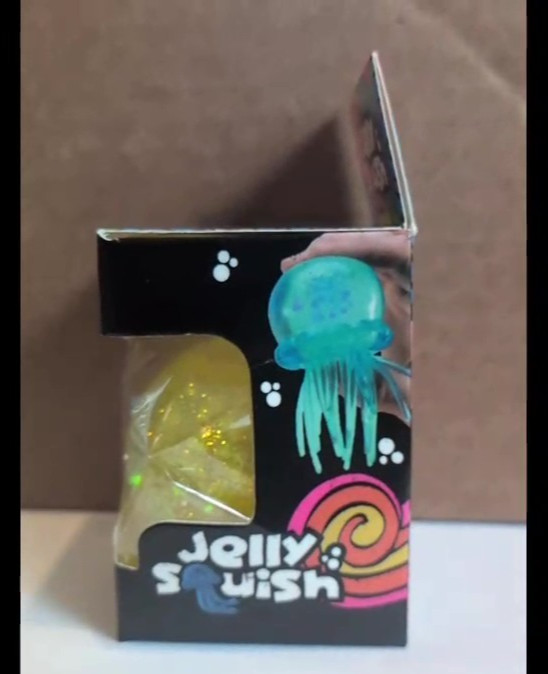 JELLY SQUISH Yellow squeezy stretchy Jellyfish with wiggly tenacles