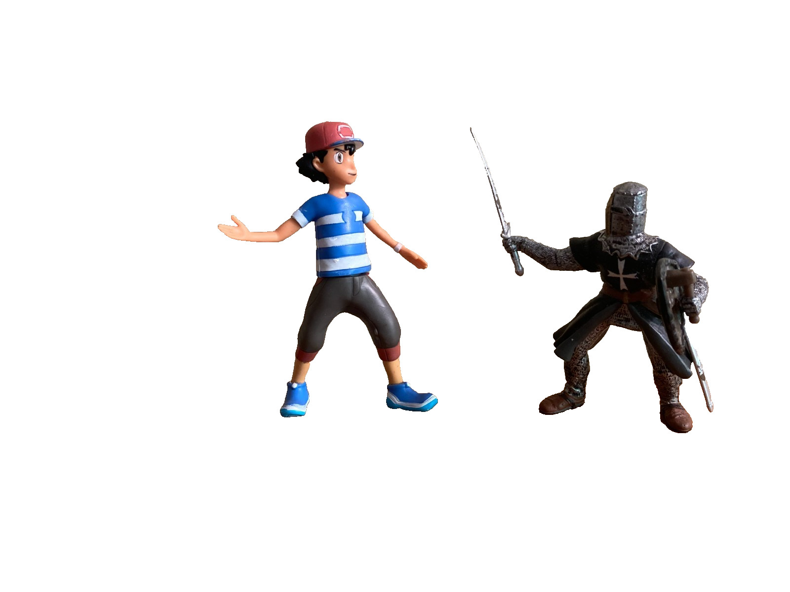 Dozen sand tray figure miniatures address ideas of childhood, danger, and safety