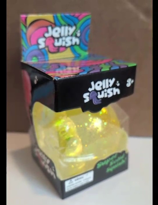 JELLY SQUISH Yellow squeezy stretchy Jellyfish with wiggly tenacles