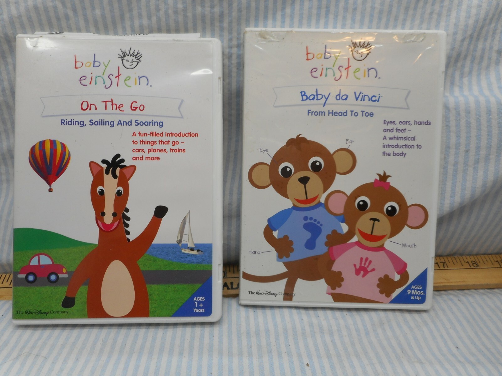 2 Baby Einstein DVD, On teh Go & Baby Da Vinci