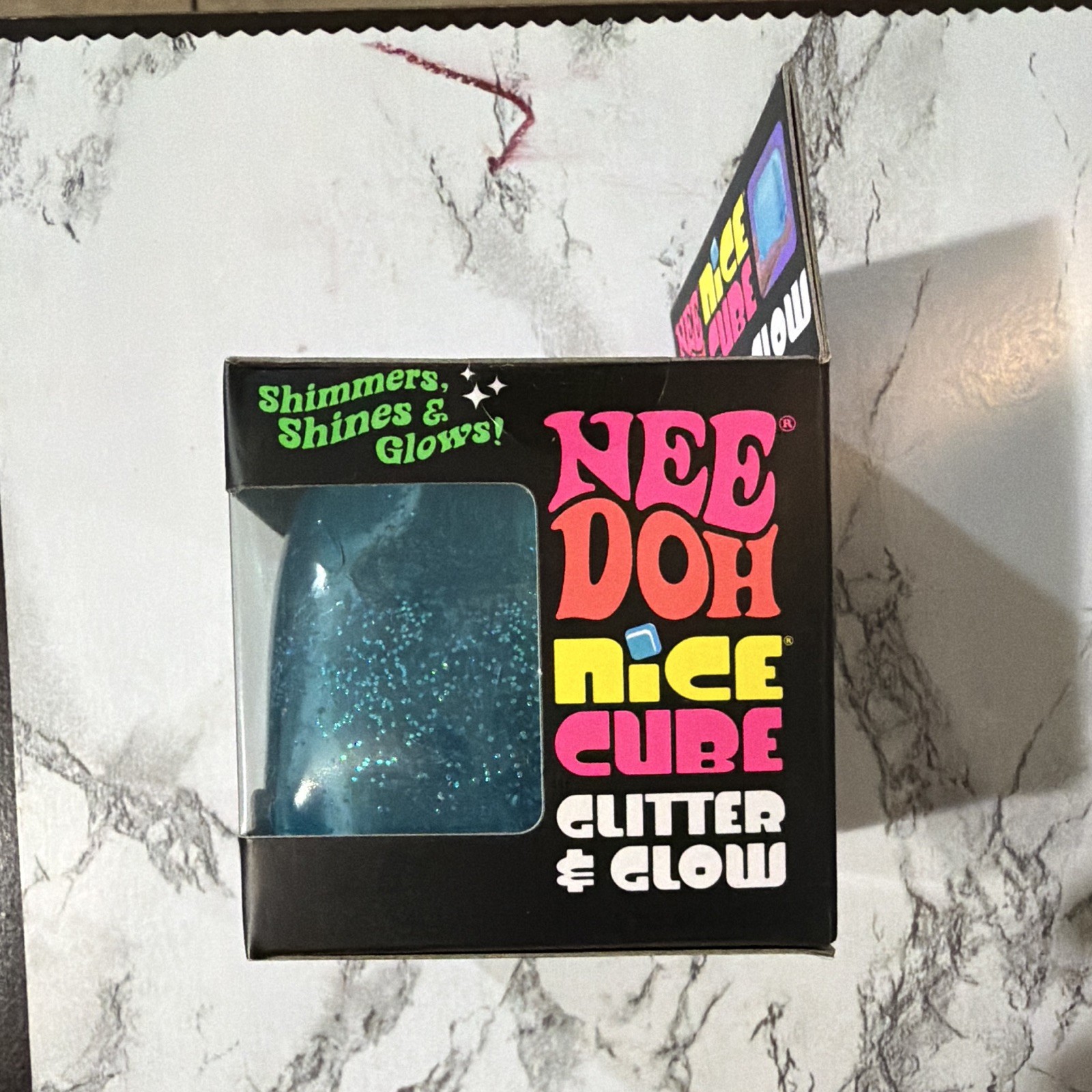 Schylling NeeDoh Nice Cube Glitter & Glow Squish Toy 4-Pack Blue Purple Pink