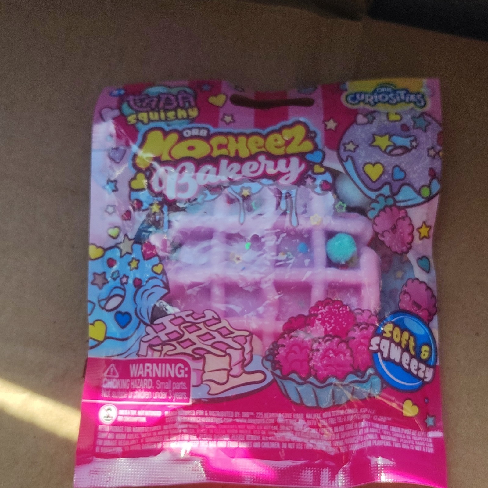 ORB MoCheez Bakery Soft & Squeezy Tactile Toy, Pink/Multicolor, 2023