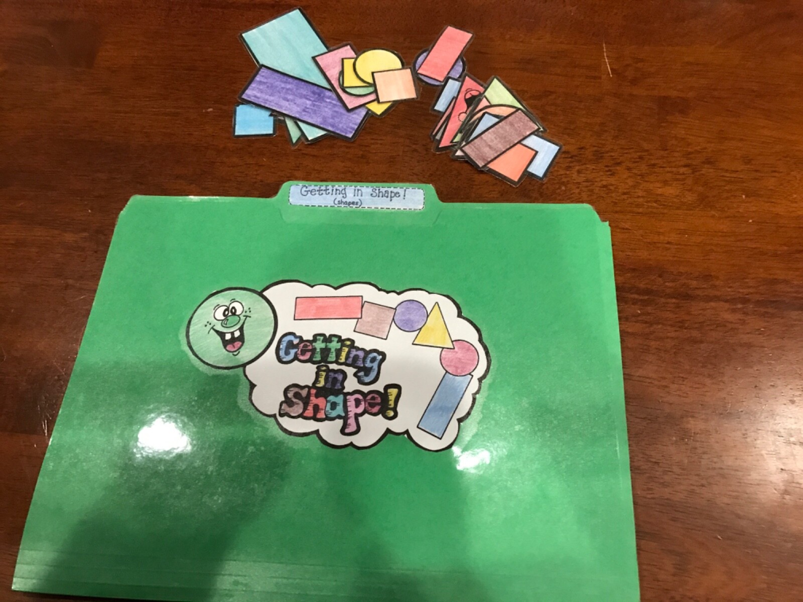 Getting in Shapes! Shapes grade preK math arts file folder game teacher