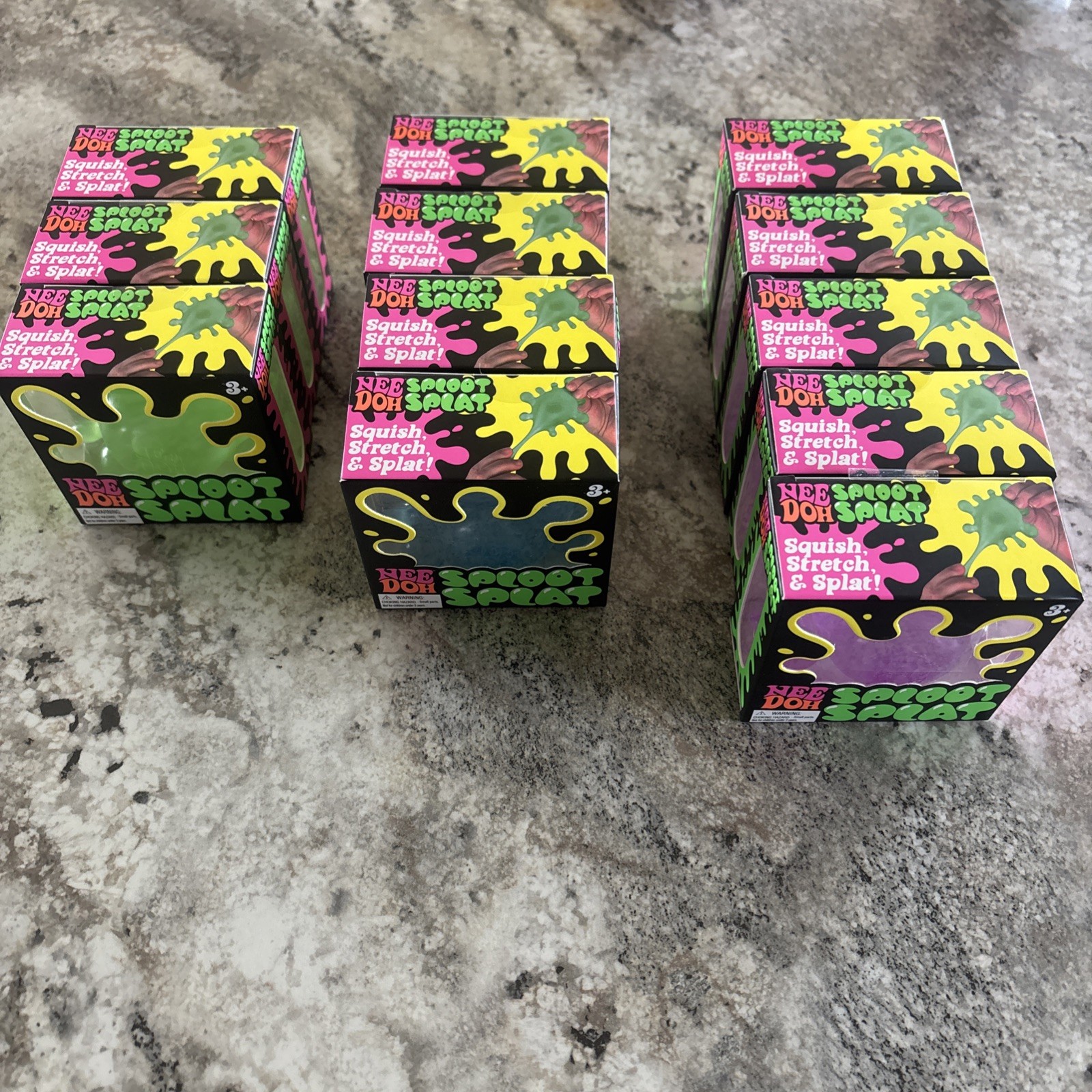 Needoh Lot Of 12 Sploot Splat Squish, Stretch, Splat Schylling Pink/Green/Blue