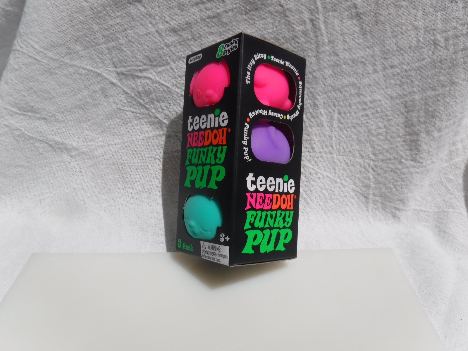 Teenie NeeDoh Funky Pup 3 Pack Pink Ziggy, Green Biscuit, Purple Honey