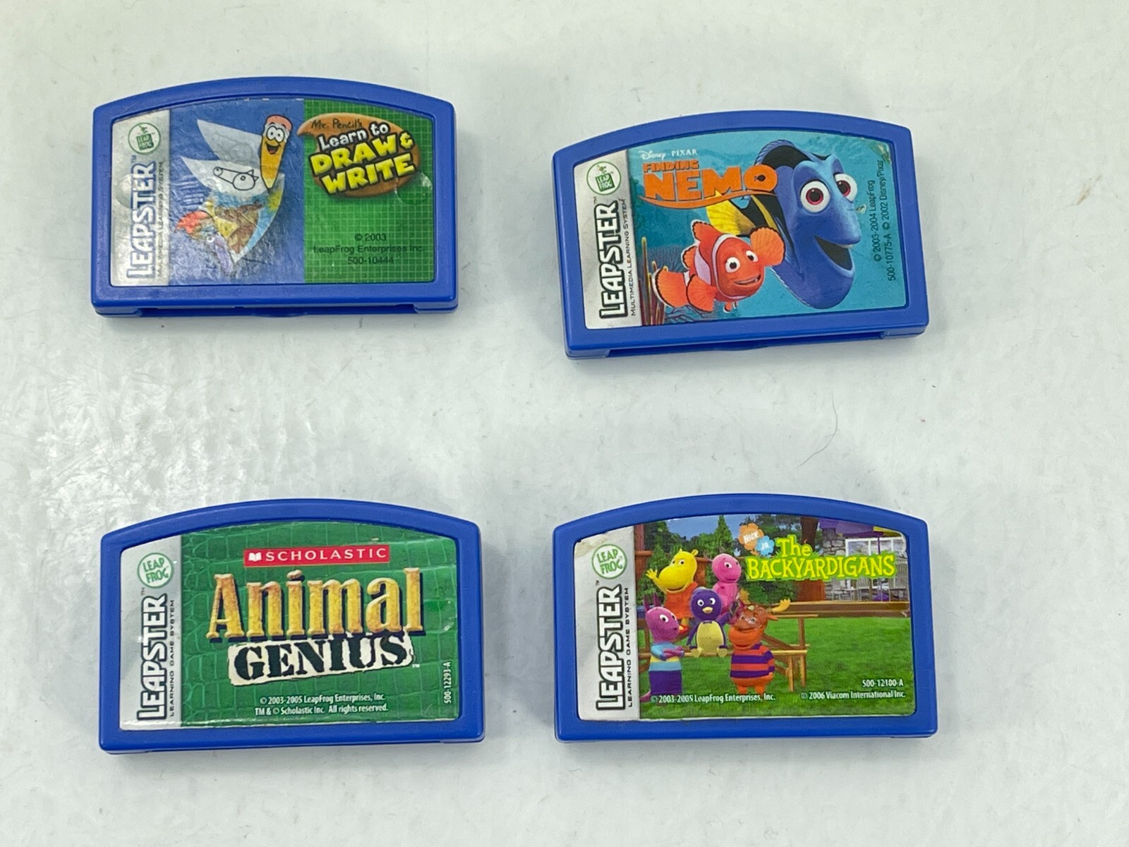 Leapster LeapFrog Finding Nemo Draw Write Animal Genius Backyardigans 4 Game Lot