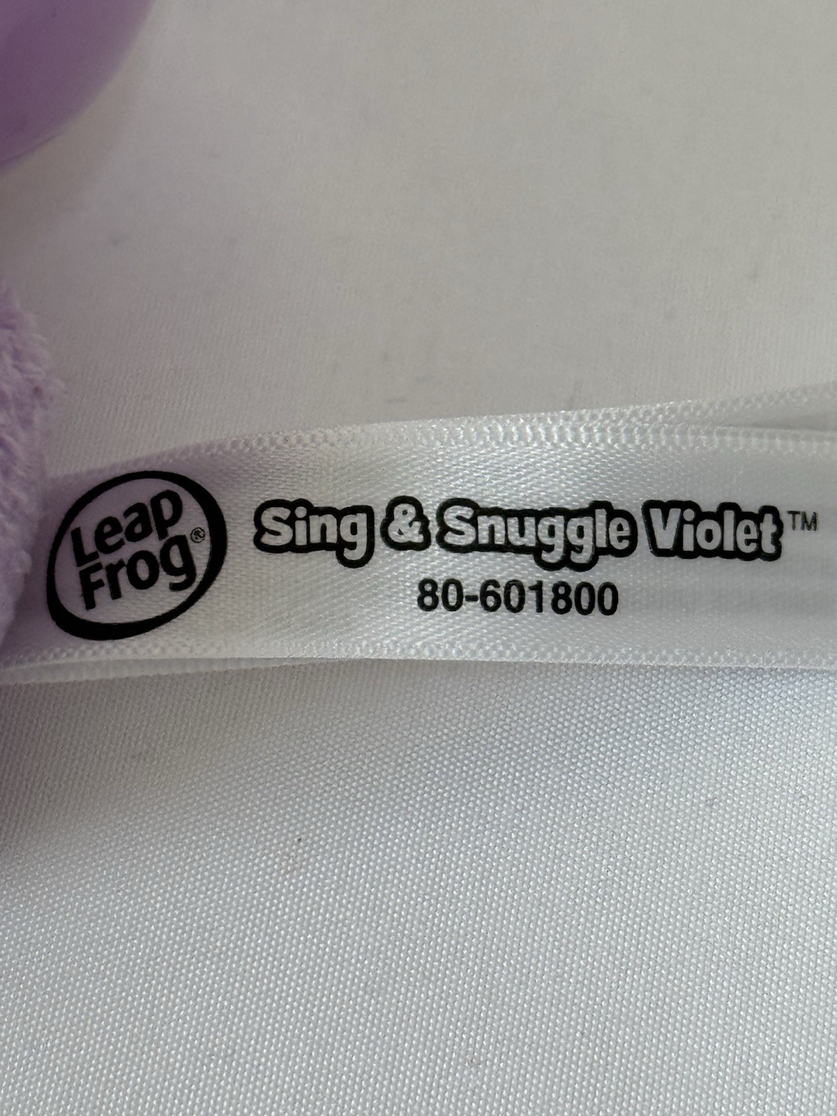 LeapFrog 7 Inch Sing & Snuggle Violet Interactive Plush Toy Neck Decal Worn Off
