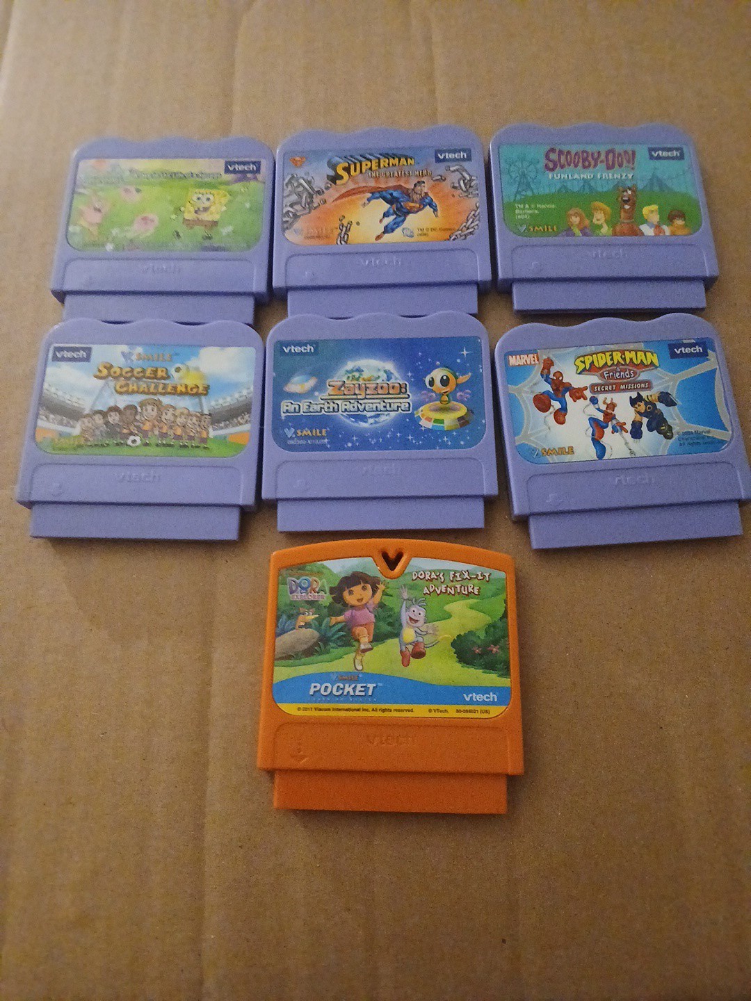 7 Lot VTech V.Smile Game Cartridges Superman Spiderman SpongeBob Scooby Doo