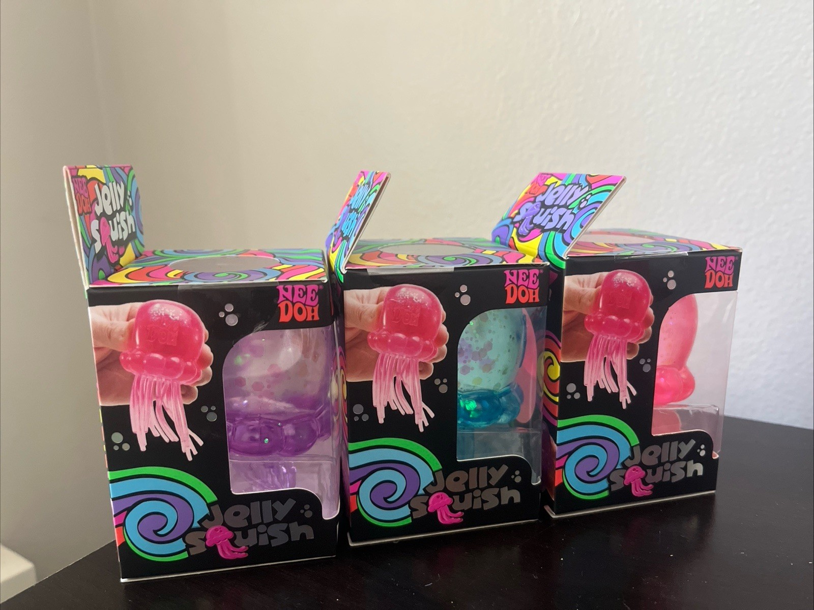 NeeDoh Nee Doh Jelly Squish Super Authentic Jelly Fish Lot Of 3 Pink Blue Purple