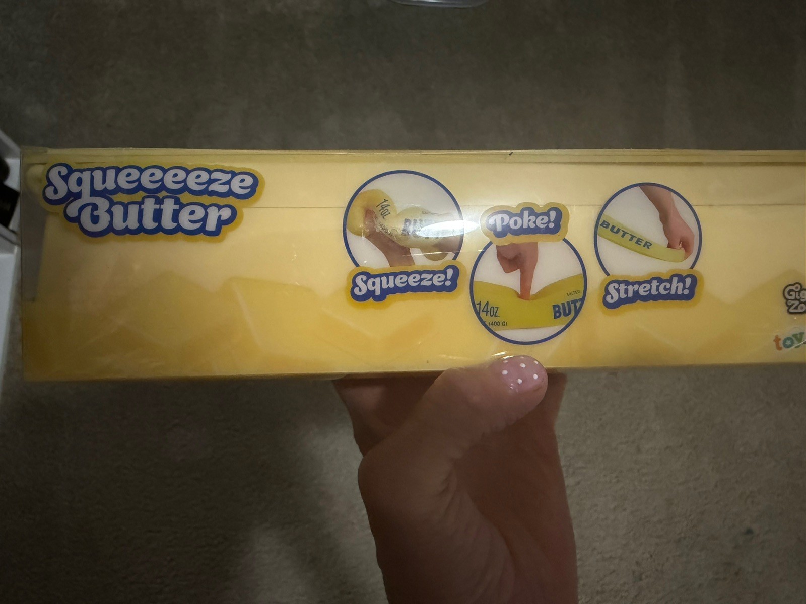 Case of 6 toymendous jumbo squishy butter in display case.